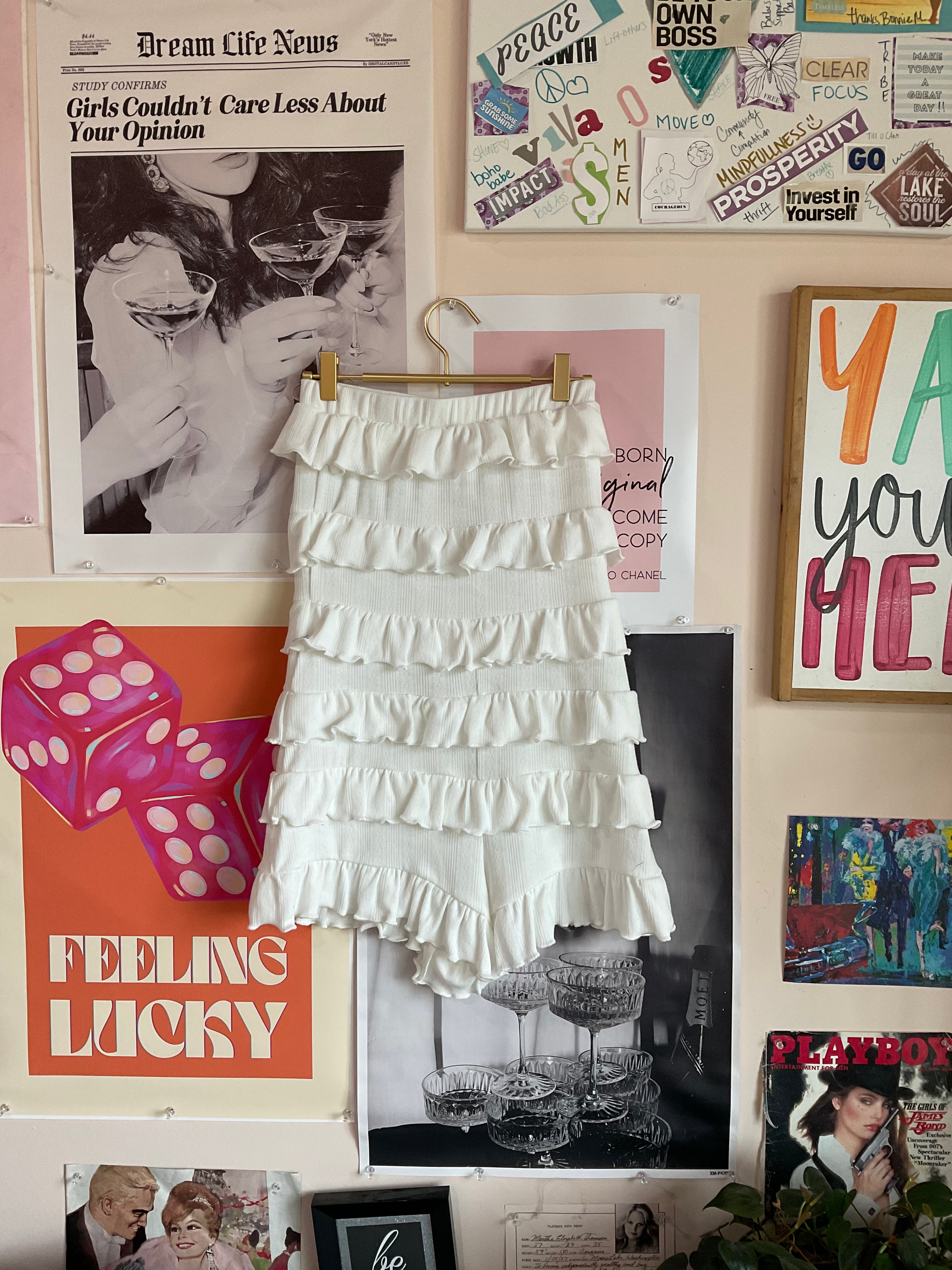 White strapless ruffle romper