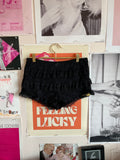 Y2K black ruffle shorts