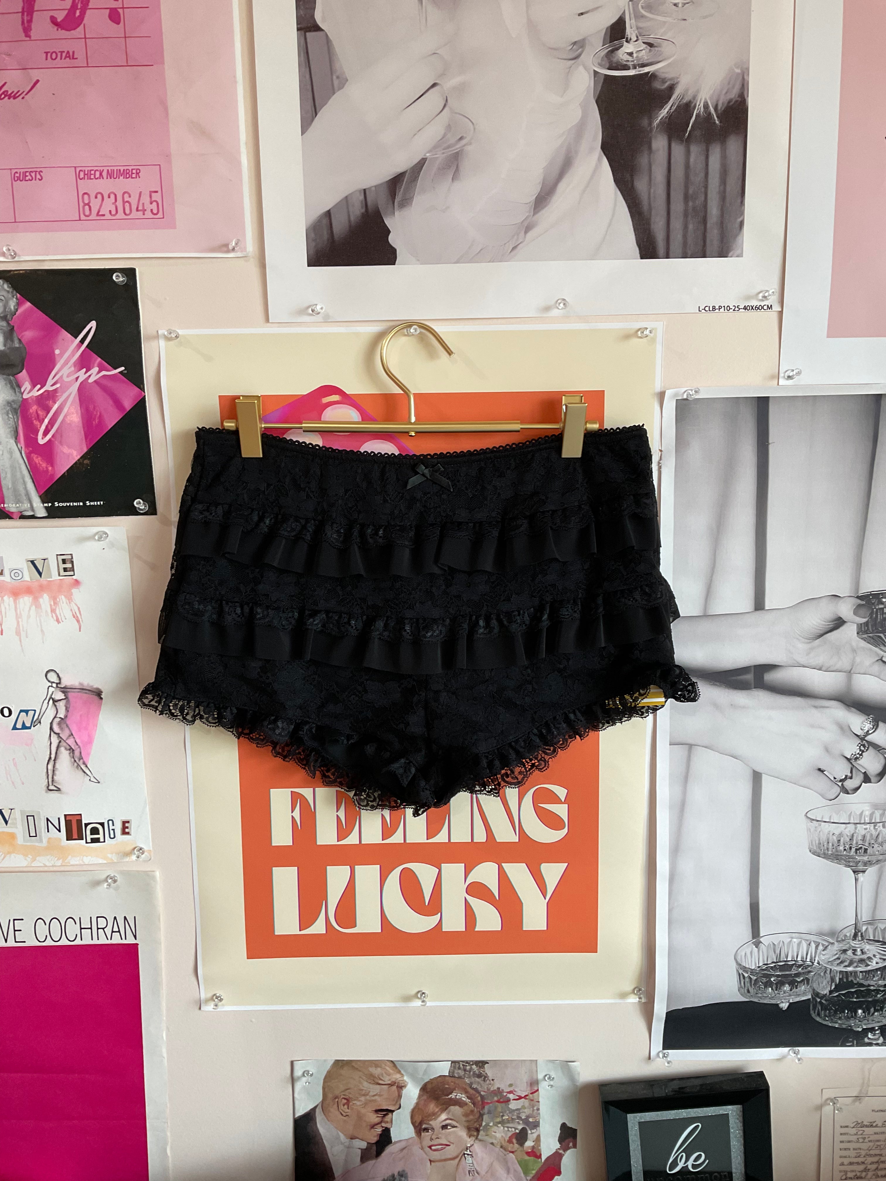 Y2K black ruffle shorts