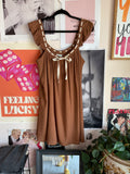 Brown sleeveless mini dress with front bow tie detail